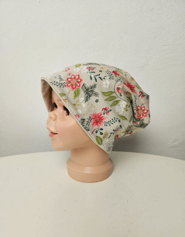 Wendemütze Jersey beige mit Blumen und Blättern Wendemütze Jersey beige mit Blumen und Blättern