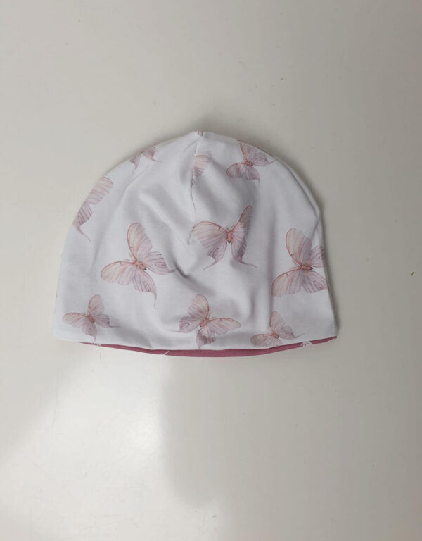 Wendemütze Bio-Jersey weiß mit rosa Schmetterlingen Wendemütze Bio-Jersey weiß mit rosa Schmetterlingen