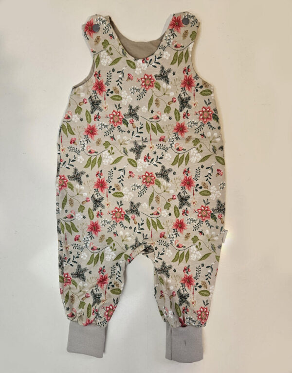 Strampler beige mit Blumen und Blättern